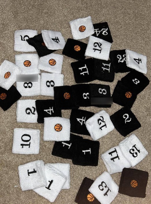 Basketball team wristbands embroidered with player numbers